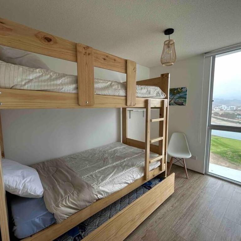 Departamento de playa con piscinas en condominio - Three-Bedroom Apartment - 13