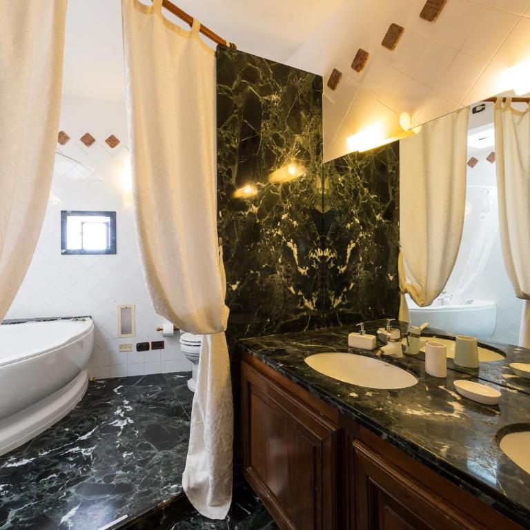 Residenza Kastrum - Suite Deluxe con Vasca Idromassaggio - 3