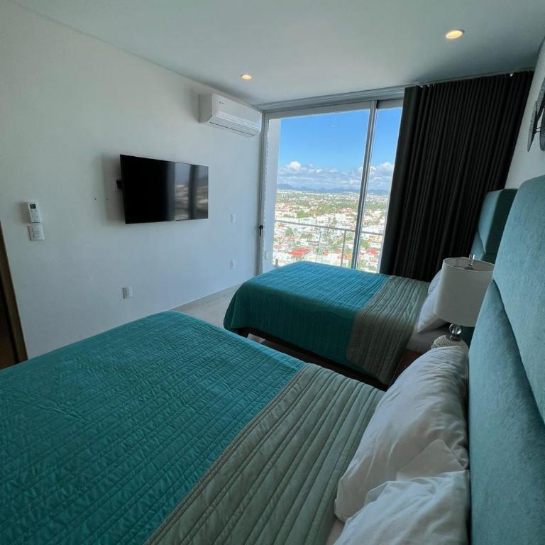 Camino al Mar Apartment with Amazing View of the Ocean, Beach and Swimming Pool - Three-Bedroom Apartment - 6