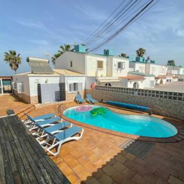 Beachfront Villa San Antonio with Private Heated Pool BBQ in the Heart of Corralejo by Amazzzing Travel - Villa - 4