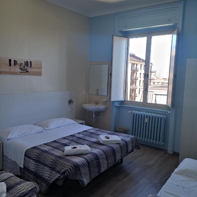 Hotel Kennedy - Camera Quadrupla con Bagno in Comune - 4