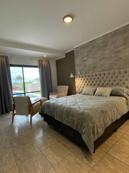 Bitcoins House Los Carpinchos Laguna Brava - Three-Bedroom House - 15
