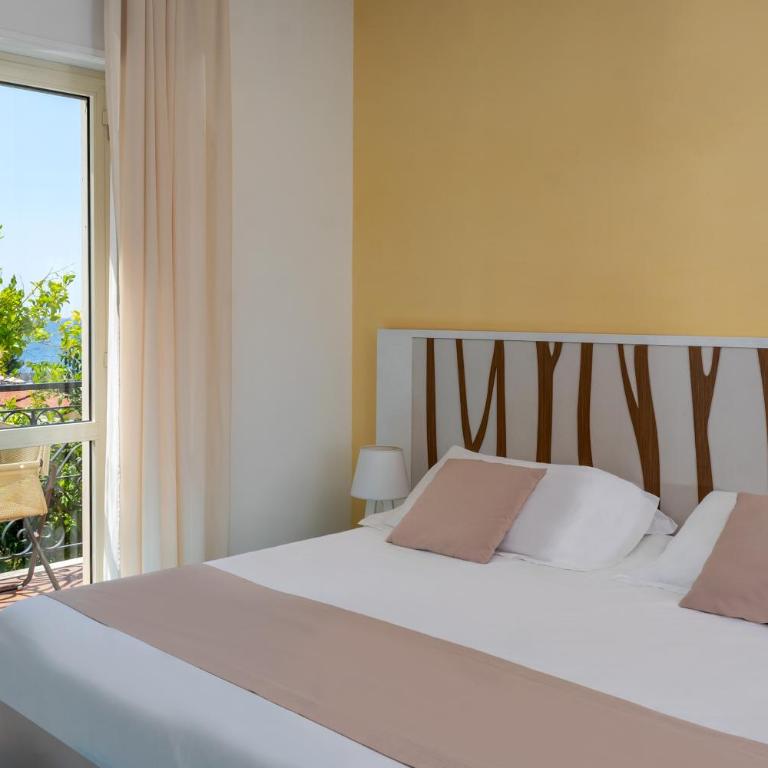 Hotel Le Axidie - Camera Matrimoniale/Doppia con Letti Singoli con Vista Mare Parziale - 1