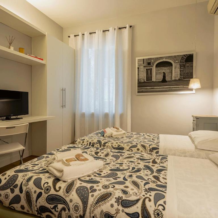Fotofever Apt, two bedrooms with air conditioned in elegant shopping area, close to Vatican City - Appartamento con 2 Camere da Letto - Piano Terra - 22