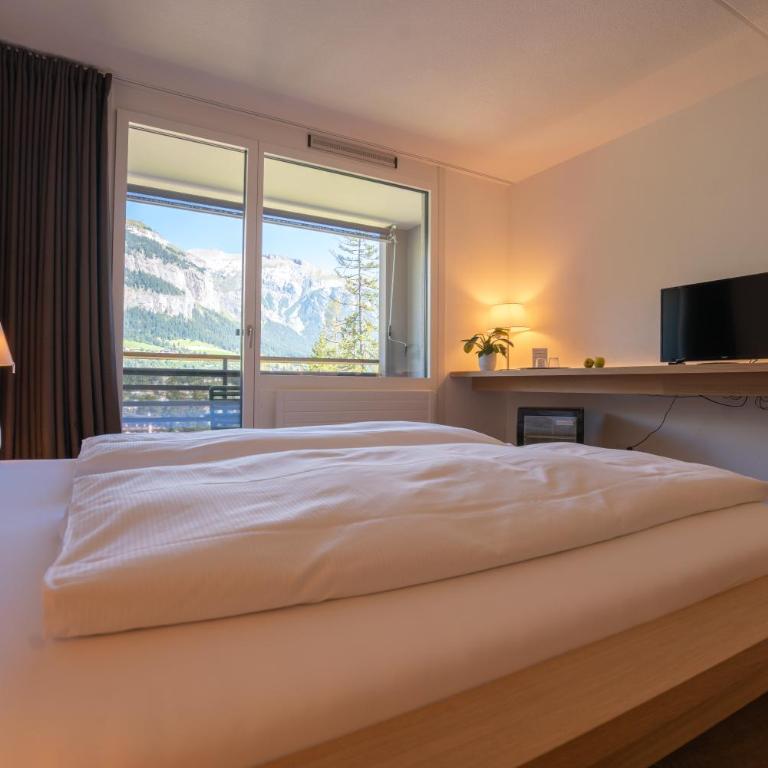 Hotel des Alpes - Superior Doppelzimmer mit Balkon und Zugang zu Innenpool und Sauna - 7