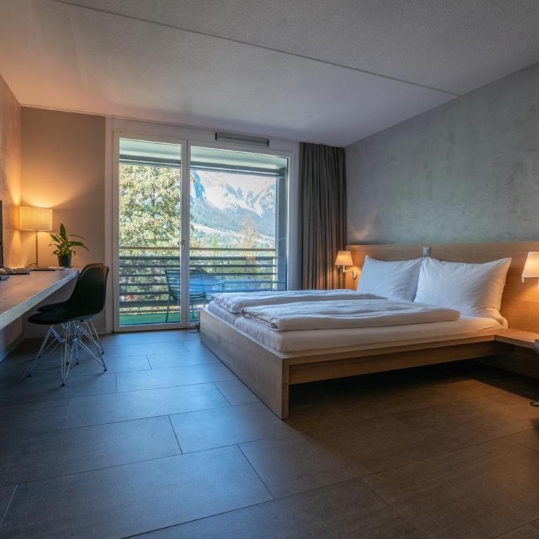 Hotel des Alpes - Superior Doppelzimmer mit Balkon und Zugang zu Innenpool und Sauna - 11