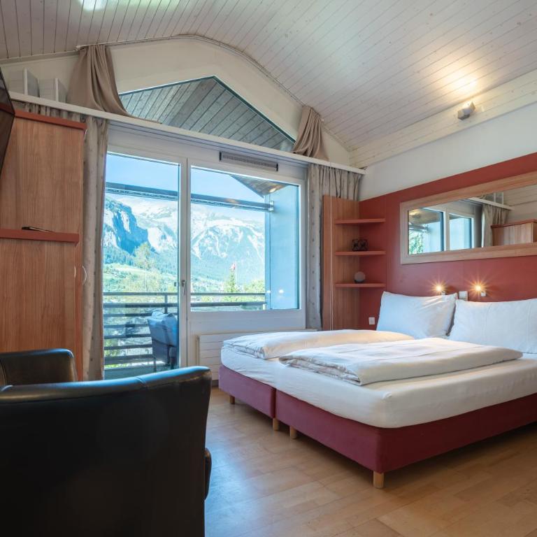 Hotel des Alpes - Comfort Doppelzimmer mit Balkon und Zugang zu Innenpool und Sauna - 4