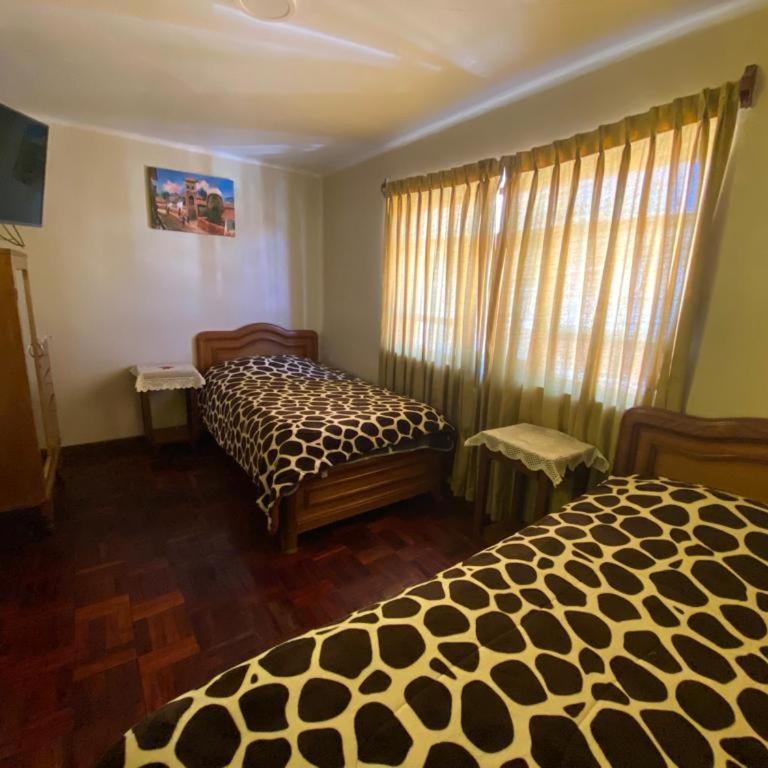 Residencial 10 de Noviembre - Habitación Doble con baño compartido - 2 camas - 2