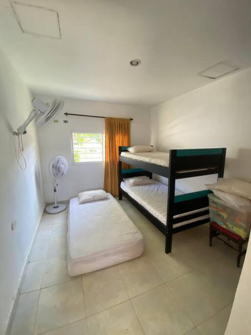 Cabaña con piscina y Cerca al mar VILLA CONEJO - Three-Bedroom House - 12