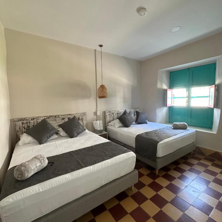 CASA HOTEL LAS HORTENSIAS - Habitación Doble con baño privado externo - 2 camas - 1