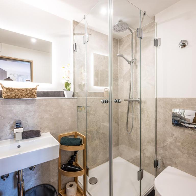 Ferienwohnungen Alpensonne - Appartement - Vue sur Jardin - 24