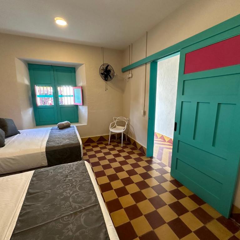 CASA HOTEL LAS HORTENSIAS - Habitación Doble con baño privado externo - 2 camas - 6