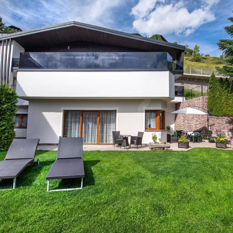 Appartamenti Olympic - Appartamento Deluxe con 2 Camere da Letto e Vista Giardino - 1