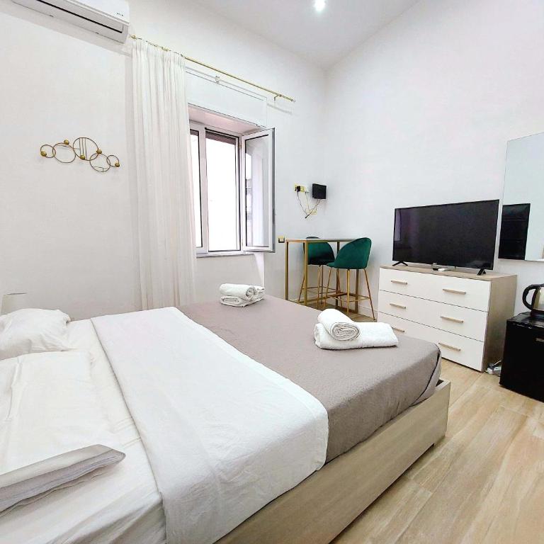 Berenice Suites - Camera Quadrupla con Bagno Privato Esterno - 8