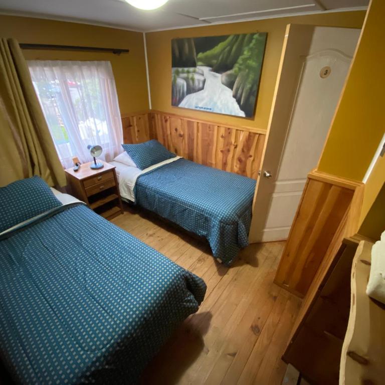 Hostería Futaleufu - Habitación Estándar con baño compartido - 2 camas - 4