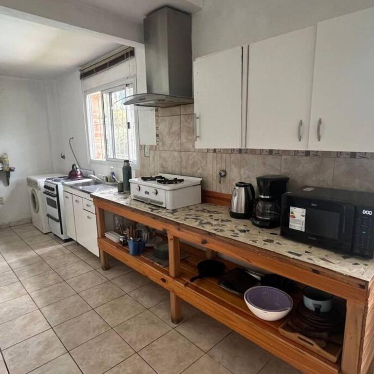Cosquín Casa a metros del río con pileta - Hasta 12 personas - Casa de 4 dormitorios - 34