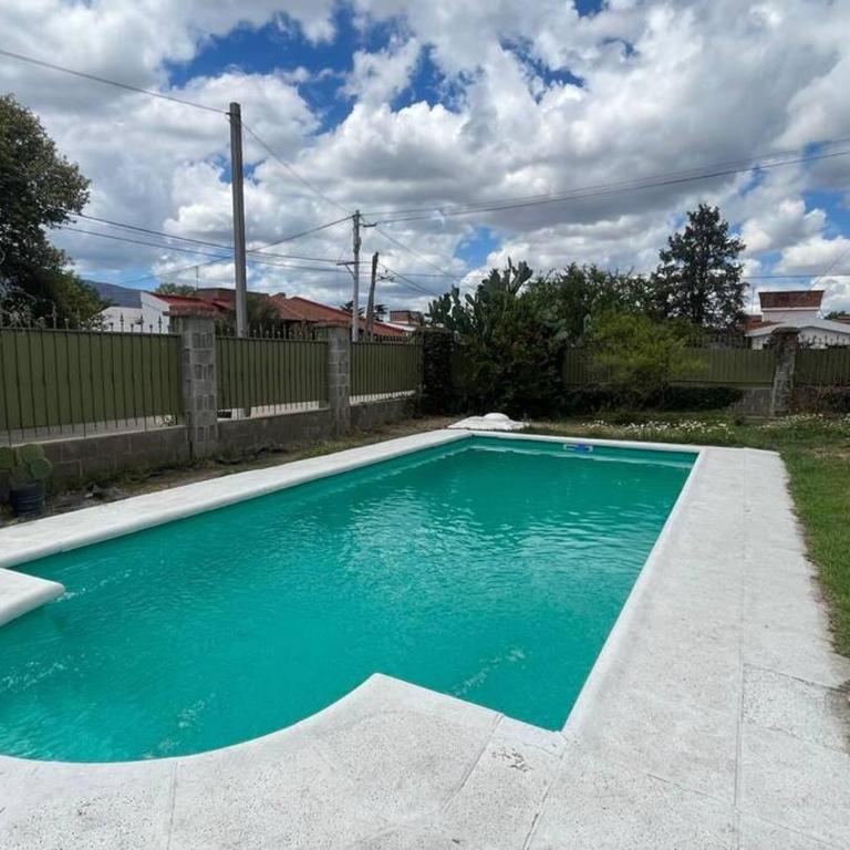 Cosquín Casa a metros del río con pileta - Hasta 12 personas - Casa de 4 dormitorios - 64