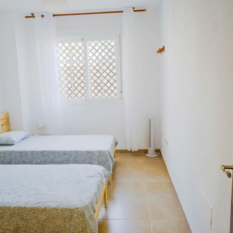 Piscina playa y relax en familia - Two-Bedroom House - 12