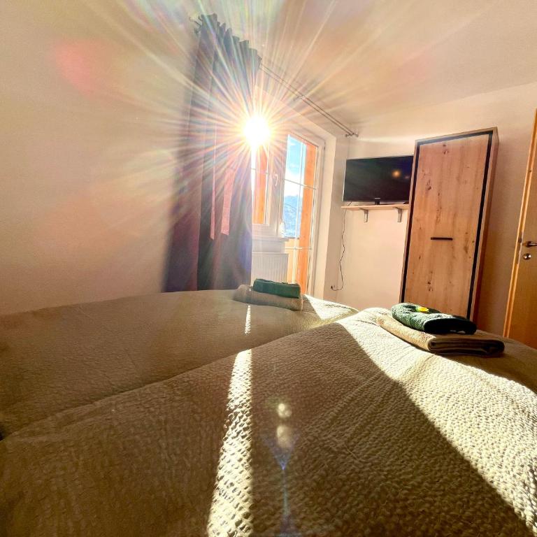 Landhaus Alpenzeit - Apartment mit 3 Schlafzimmern und Dusche - 35