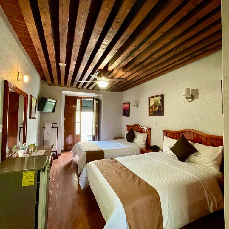 Hotel Puebla Plaza - Habitación Cuádruple Clásica - 8