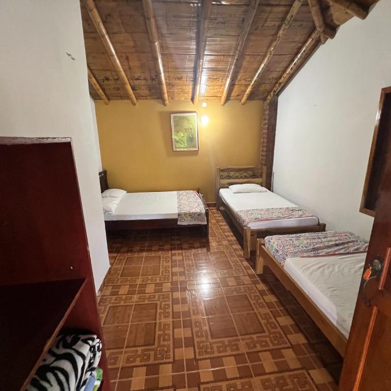 Villa Alejandra Del Quindio - Habitación Cuádruple - vistas al jardín - 1