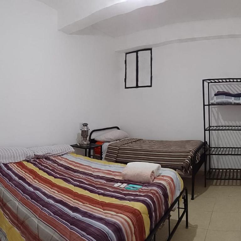 Hostal Los Faroles Chicoana - Habitación Triple - 8