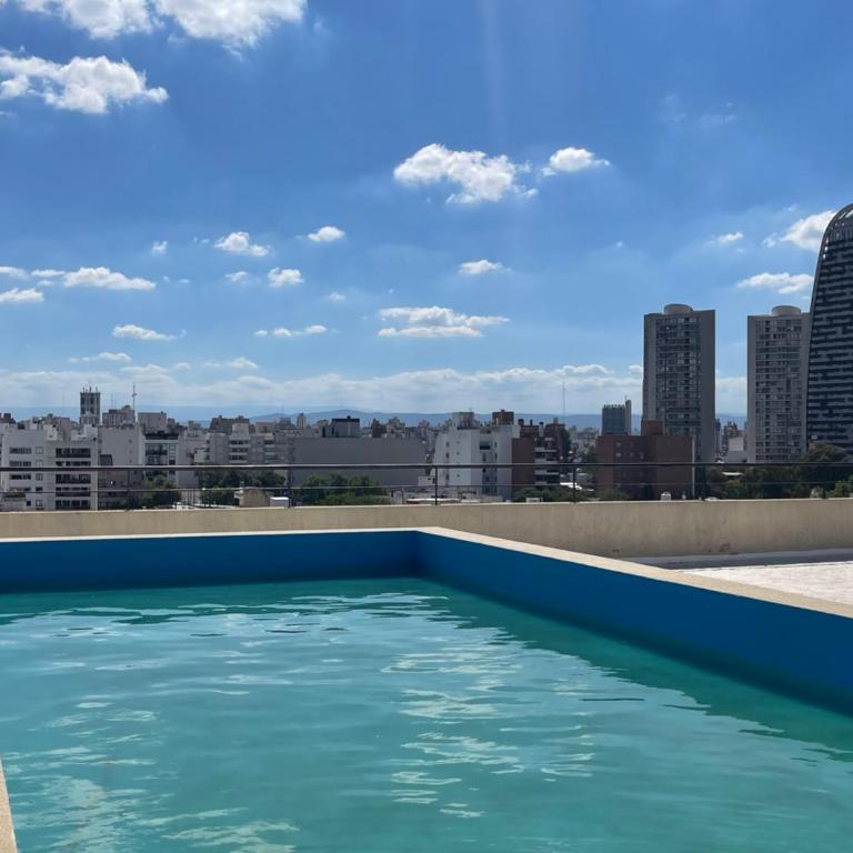 Departamento con PILETA y gran balcón terraza con quincho y asador propio - Apartamento de 1 dormitorio - 32