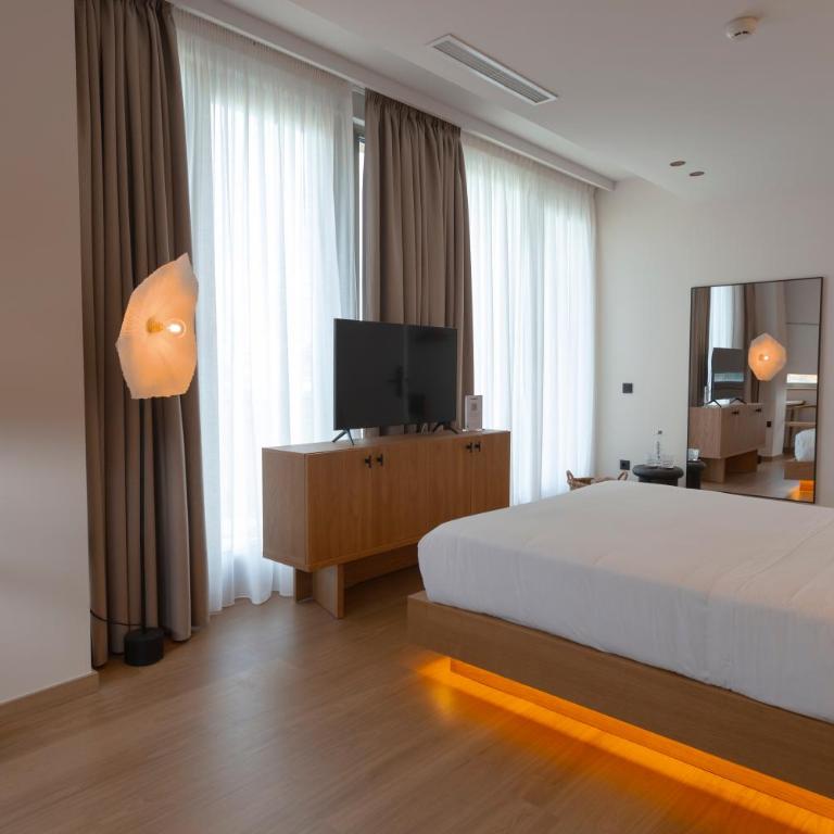 Malates Slow Boutique Hotel - Habitación Doble Deluxe con vistas laterales al mar - 4