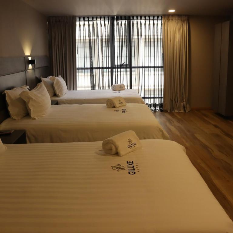 Giluxe Hotel - Habitación Triple - 8