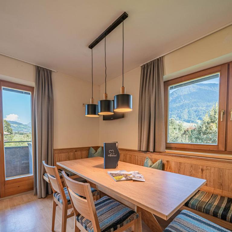 Appartements Andrea Cäciel - Alpline Appartements KG - Apartment mit Blick auf die Berge - 7