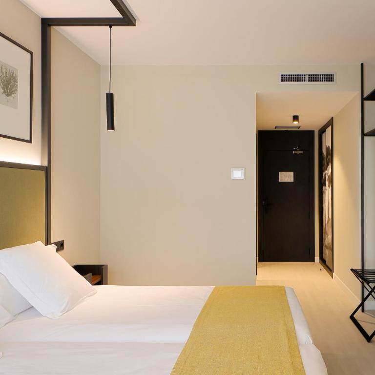 Nuvō Hotel Boutique - Habitación Doble con vistas - 2 camas - 4