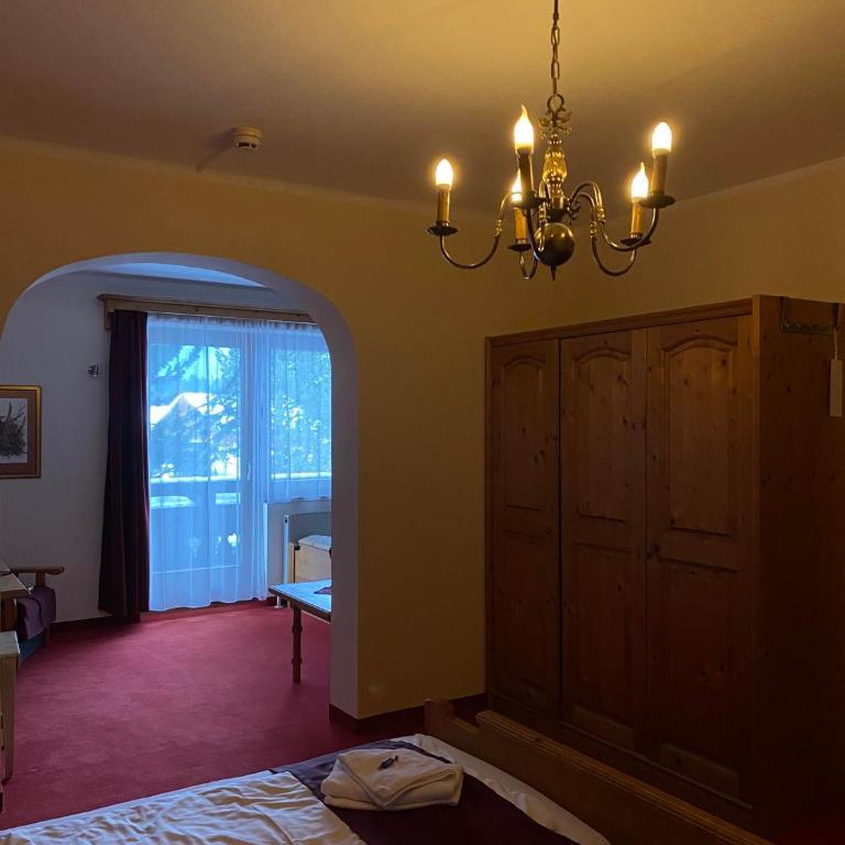 Hotel Aquamarin - Vierbettzimmer mit Bergblick - 3
