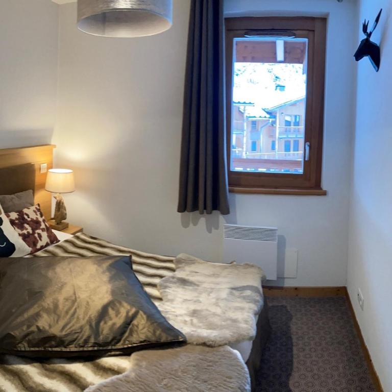 Bel appartement avec balcon et parking couvert - FR-1-464-217 - Appartement - 4