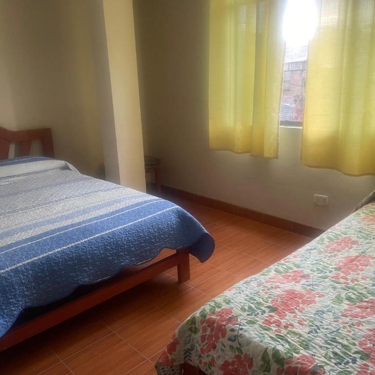 Hostal Alborada - Habitación Doble - 2 camas dobles - 1