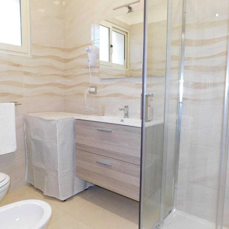 Cariteo Home - Appartamento con 2 Camere da Letto - 9