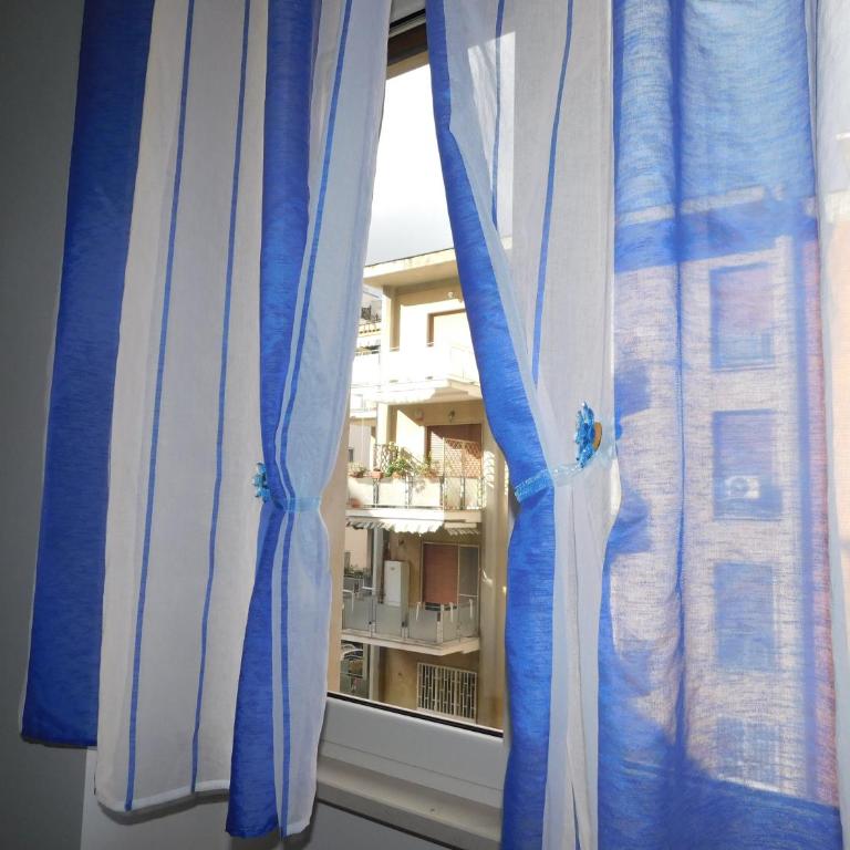 Cariteo Home - Appartamento con 2 Camere da Letto - 11