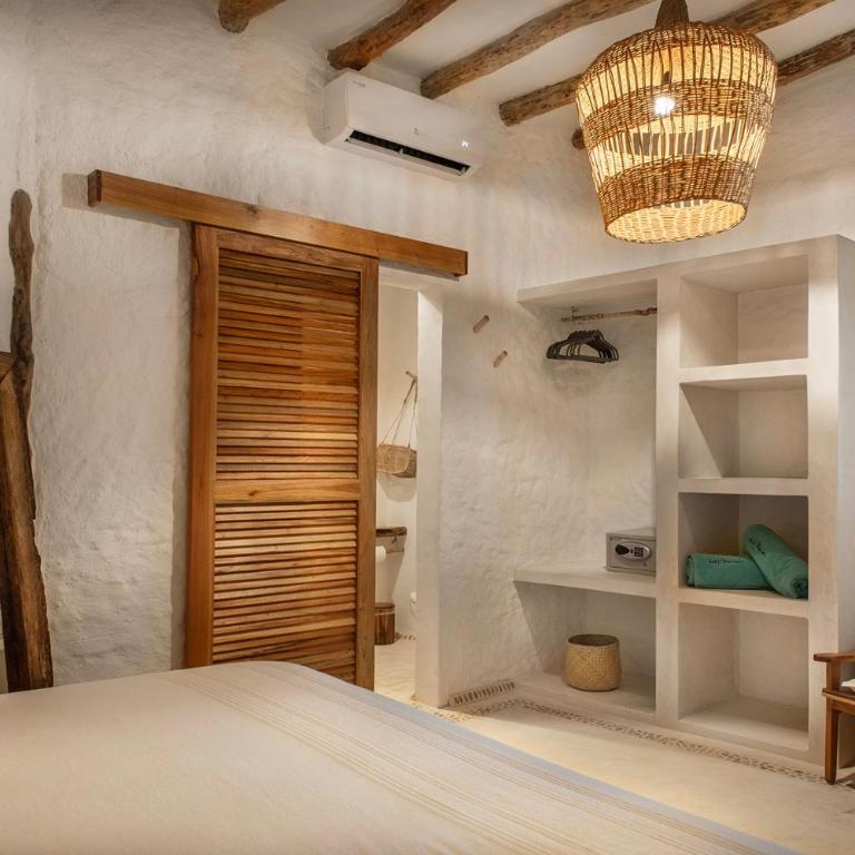 Mawimbi Boutique Hotel - Habitación Estándar - 1 cama grande - 1