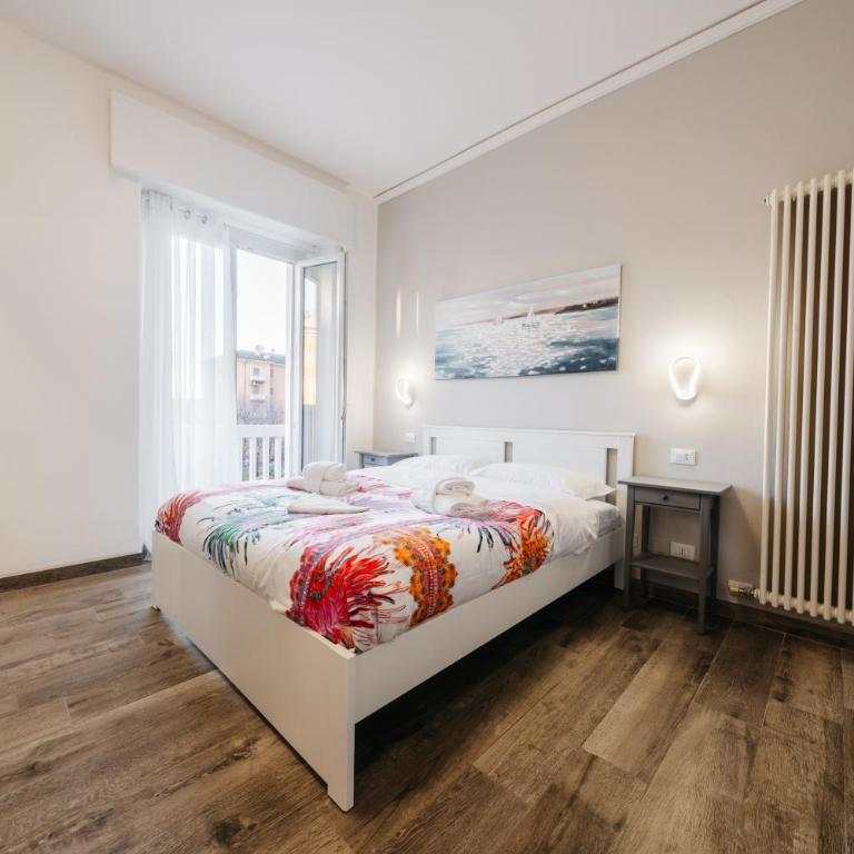Porta Nuova Suites - Camera Matrimoniale Deluxe con Balcone - 1