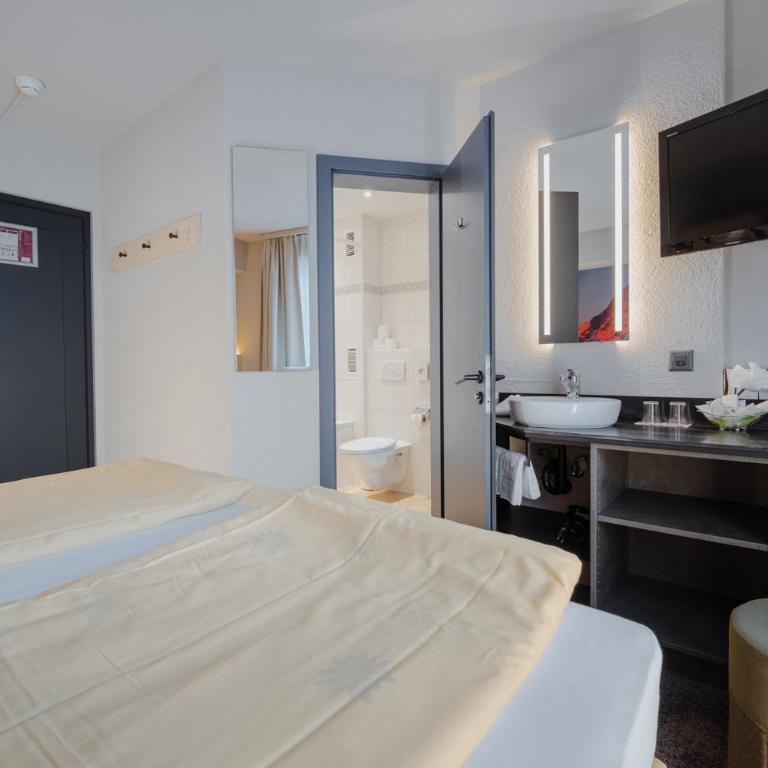 Hotel Central Wolter - Grindelwald - Familienzimmer mit Balkon (4 Personen) - 5