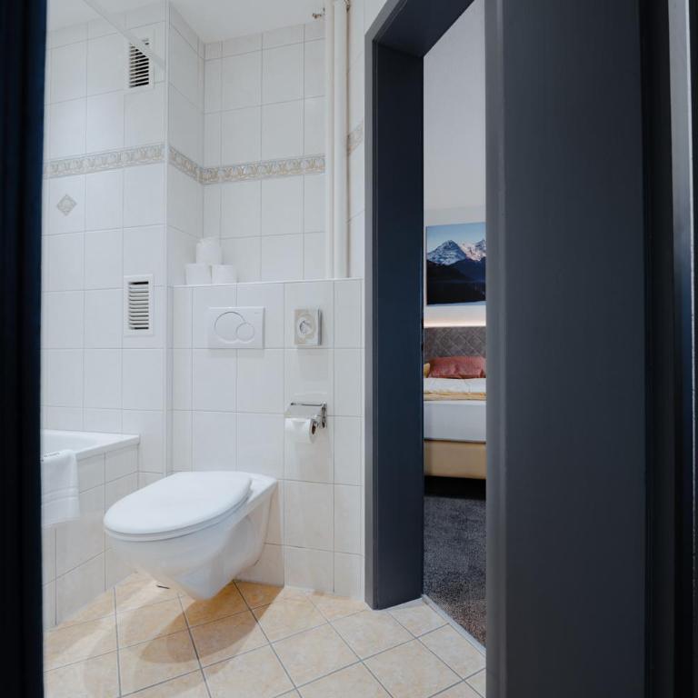 Hotel Central Wolter - Grindelwald - Familienzimmer mit Balkon (4 Personen) - 9