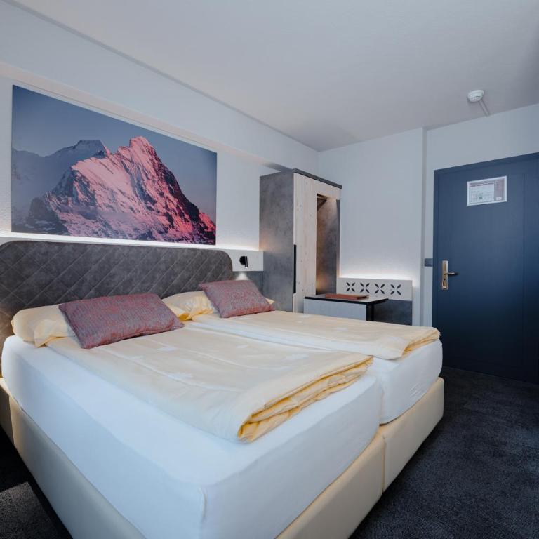 Hotel Central Wolter - Grindelwald - Familienzimmer mit Balkon (4 Personen) - 1