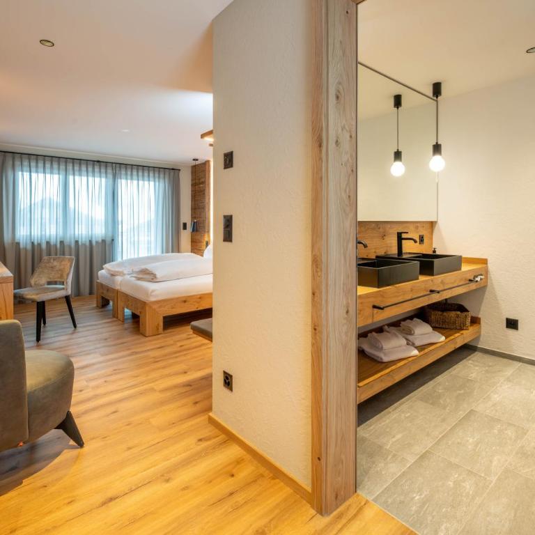 Mountain Lodge - Deluxe Doppelzimmer mit Balkon - 7