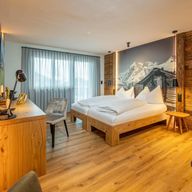 Mountain Lodge - Deluxe Doppelzimmer mit Balkon - 5