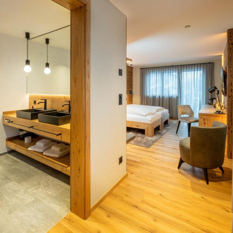 Mountain Lodge - Deluxe Doppelzimmer mit Balkon - 8