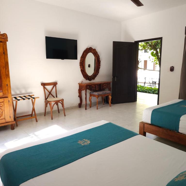 Hotel Fundadores - Habitación Doble con vistas a la piscina - 2 camas - 2