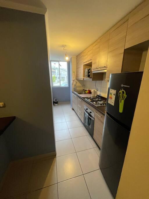 Cómodo departamento Agua Santa - Two-Bedroom Apartment - 11