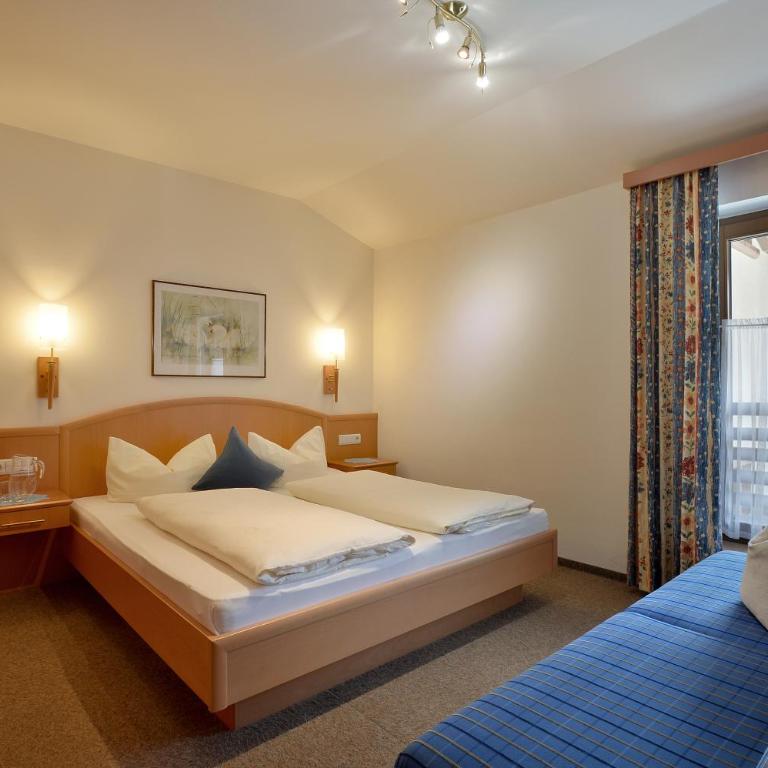 Hotel Garni Jennewein - Apartment mit 2 Schlafzimmern und Balkon - 8