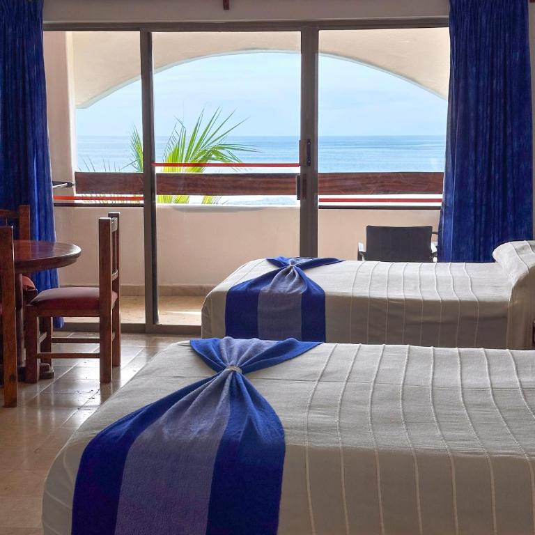 Hotel Quijote Inn - Suite con zona de cocina - 1
