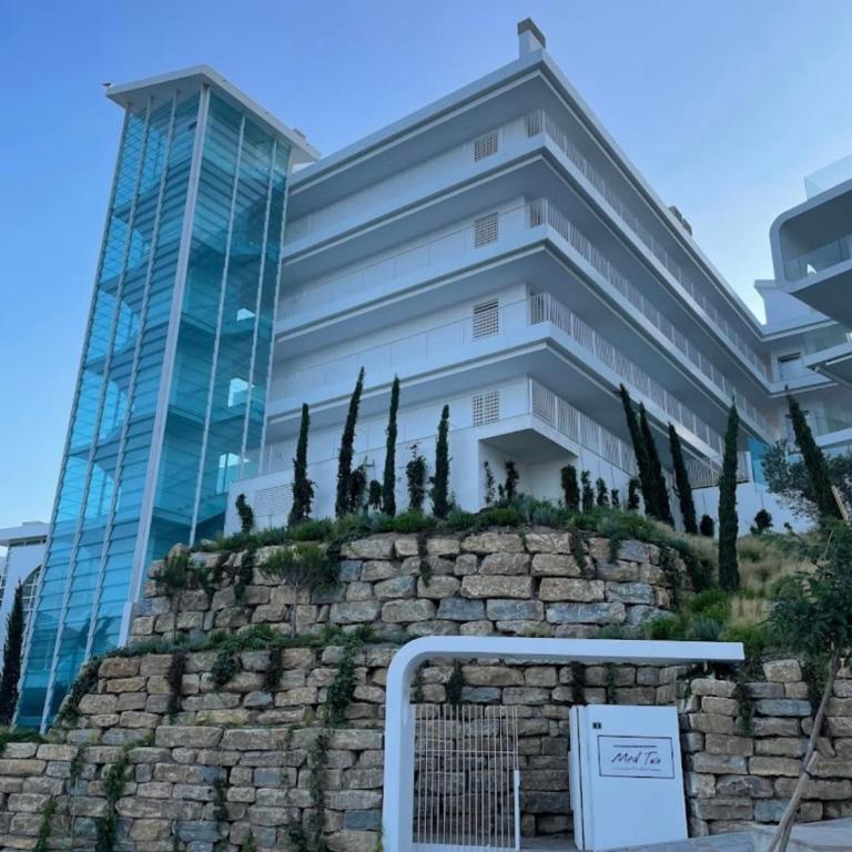 Luxe Coast Views-Reserva del-Higuerón-Pool & Sea - Two-Bedroom Apartment - 19