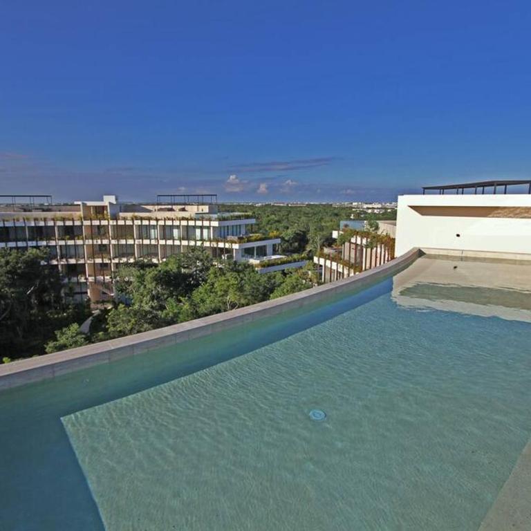 Luxury Jungle Loft, 7 Pools, Rooftop Panoramic View, Beach Shuttle, Fast WiFi - One-Bedroom Apartment - 43